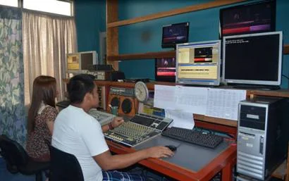 Working at the CBCFI on-air desk.